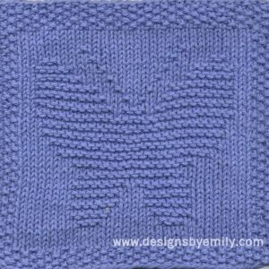 Knit dishcloth with design of a butterfly created with knit and purl stitches